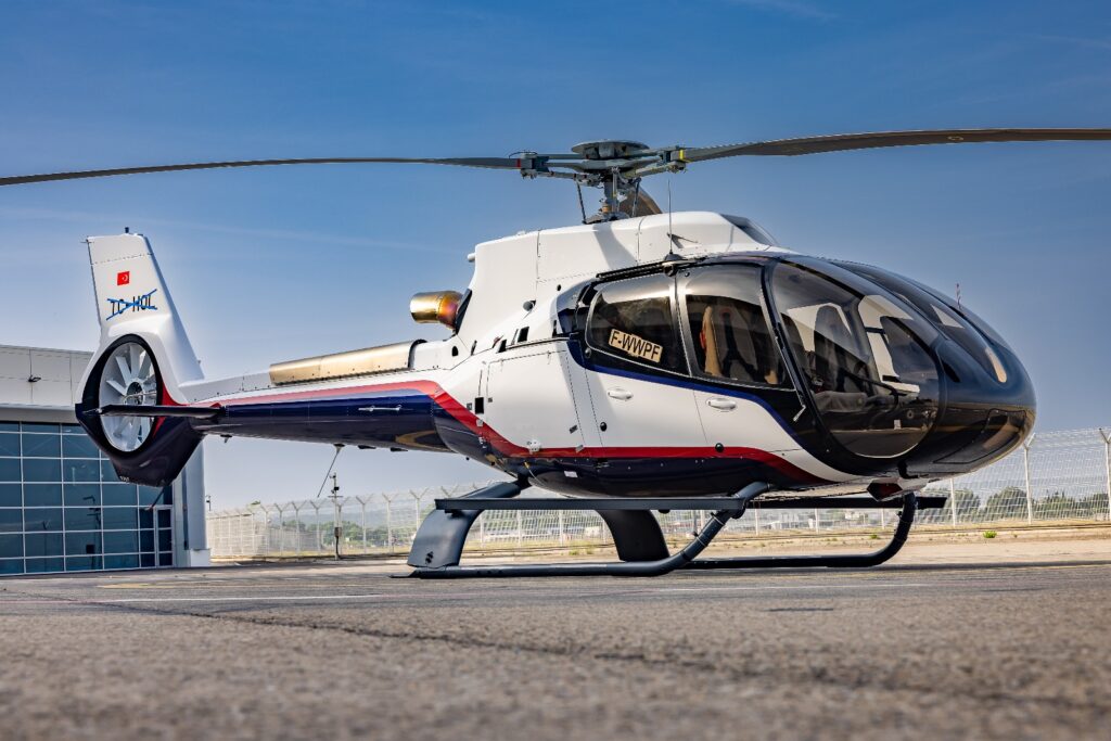 Tesla Travel VIP Helicopter Services luxury private helicopter transfer flying VIP guests above Bodrum coastline to exclusive resorts, yachts, vineyards, and Greek islands.