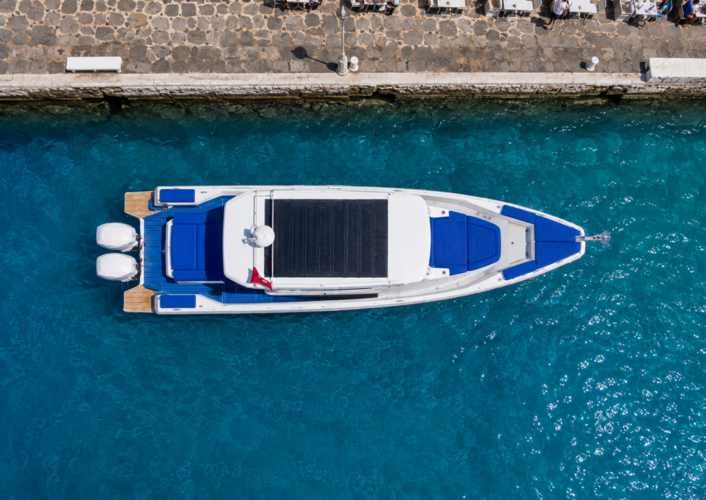 Tesla Travel Bodrum Mykonos Fast Transfer luxury Axopar 37 speedboat cruising across the Aegean Sea between Bodrum and Mykonos.