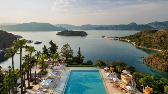 D Maris Bay Hotel luxury resort located on the Datça Peninsula with turquoise sea views, private beaches, infinity pools, and exclusive Mediterranean architecture.