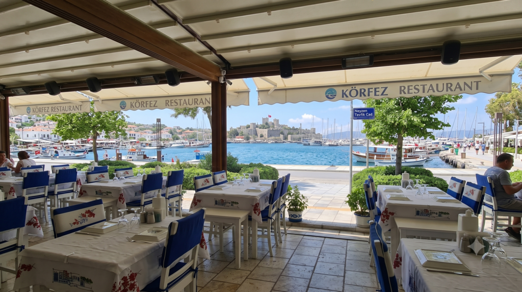 Körfez Restaurant Bodrum located at Bodrum Marina serving fresh seafood, traditional Aegean mezes, Çökertme Kebabı, grilled octopus, and luxury dining with sea view in the heart of Bodrum.