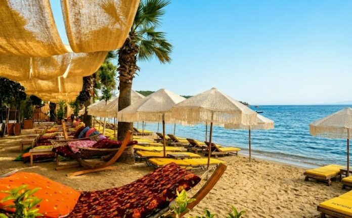 Okaliptus Hotel Beach Club Bitez luxury beachfront cabanas private umbrellas sunset restaurant crystal clear sea watersports VIP beach experience in the heart of Bitez Bay Bodrum Okaliptus Hotel Beach Club
