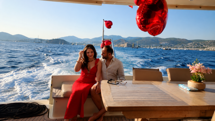 YALIKAVAK LUXURY MOTOR YACHT PROPOSAL PACKAGE exclusive marriage proposal experience aboard a luxury motor yacht in Yalıkavak, featuring a romantic sunset cruise, elegant decorations, champagne, professional photography, and breathtaking views of the Aegean Sea in Bodrum.